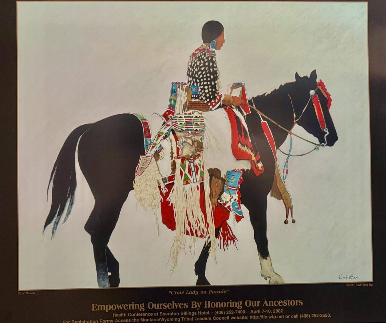 Native American woman in traditional attire riding a decorated horse.